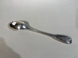 a spoon that is sitting on a table