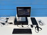 a desktop computer sitting on top of a desk with a keyboard and mouse