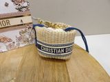 a basket that has a blue ribbon around it