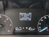 the dashboard of a car with a speedometer and other gauges