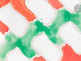 un gros plan sur un tableau réalisé avec de la peinture verte et rouge