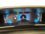 the dashboard of a car with a digital display on it