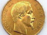 une image montrant un gros plan d'une pièce d'or à l'effigie d'un homme