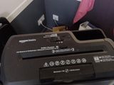 a printer sitting on top of a desk next to a keyboard