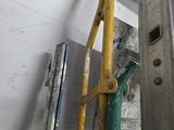a ladder that is leaning against a wall in a room
