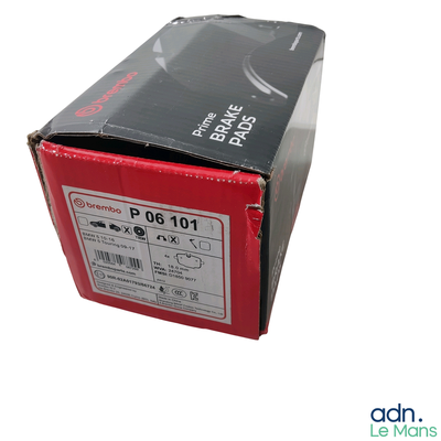 a red box with a black and white label on it