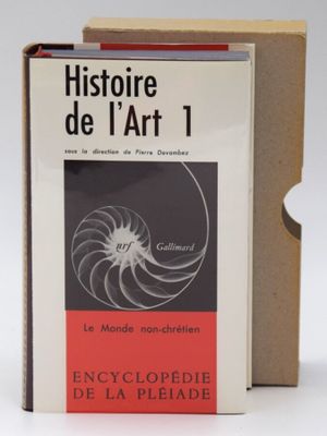 an image of a book sitting on top of a table next to a box