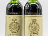 deux bouteilles de vin posées l'une à côté de l'autre sur une table