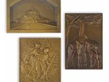 a set of four bronze plaques depicting animals and a castle