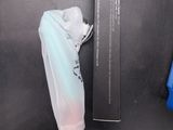 a toothbrush that is next to a box of toothpaste