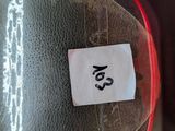 a close up of a helmet with a sticker on it