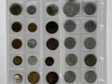 a lot of coins in a plastic case on the table