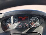 a close up of a car dashboard with a speedometer