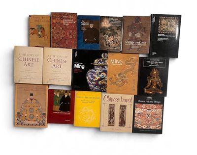 a lot of books that are sitting on a white surface