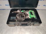 an image of a tool box with a cord and a cord cutter in it