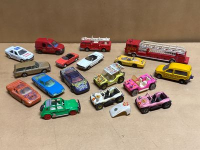 a lot of toy cars that are sitting on a table