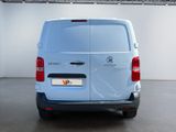 a white van that is parked in a garage
