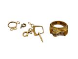 a pair of scissors and a pair of rings on a white background