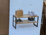 a cardboard box with a picture of a shoe rack on it