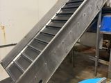 an image of a conveyor belt in a factory
