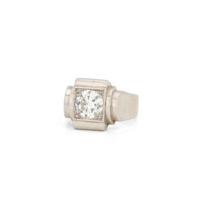 a white gold ring with a square diamond set in the center