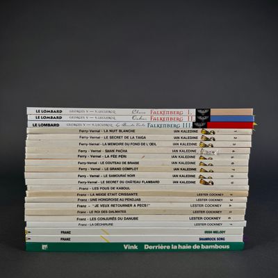 many books stacked on top of each other on a table