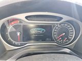 a close up of a car dashboard with a speedometer