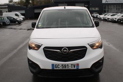 a white van that is parked in a parking lot