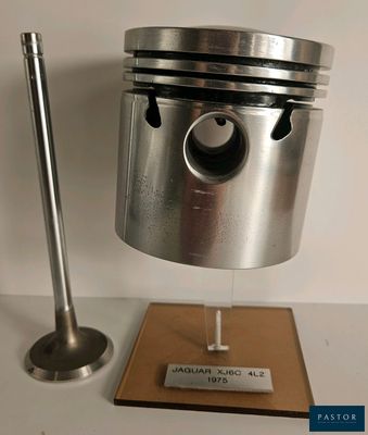 a close up of a piston and a cylinder on a table