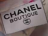 chanel boutique label on a dress with a flowered pattern