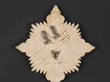 an image of a piece of paper with a bird on top of it
