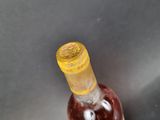 a bottle of wine that is sitting on a table