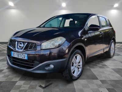 the black nissan qxv is parked in the garage