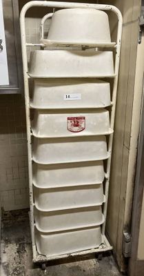an image of a stack of bins in a public restroom