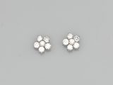 a pair of diamond earrings