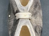 a pair of shoes that are sitting on a table