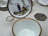 a white bowl with a gold rim and a white bowl with a gold rim and a white bowl with a gold rim and a white bowl with a gold