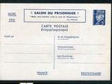 une vieille carte postale sur laquelle figure la photo d'un homme