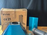 a blue laptop computer sitting on top of a wooden table
