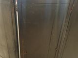 a picture of a black cabinet with two doors