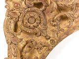 an antique gold mirror with ornate carvings on a white background