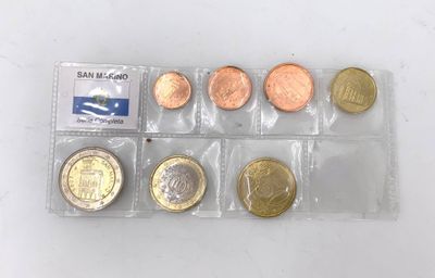 a close up of a bunch of coins in a plastic bag