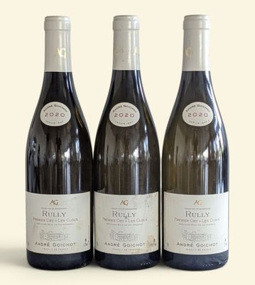 three bottles of wine sitting on top of a table next to each other