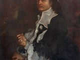 portrait of a man in a black coat and white collar holding a cigarette
