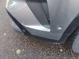 a close up of the front bumper of a car