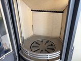 a stove that is sitting inside of a room
