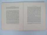 a book open to a page with a picture of a cat