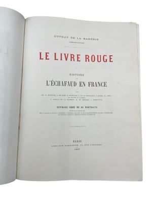an open book with a red and white title on it
