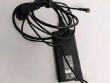 a charger that is connected to a cord on a table