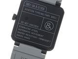 an image of a close up of a watch on a white surface